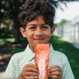 Ramalynn Montessori Academy student enjoying EllyPop outside on playground in Bloomington Minnesota